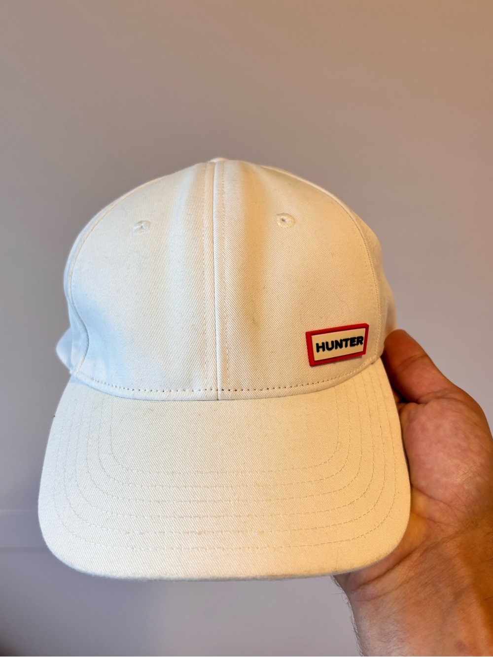 Hunter Cream Baseball Cap with Red Logo Accent